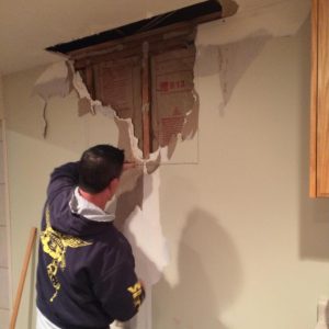 Cut along the drywall lines you made