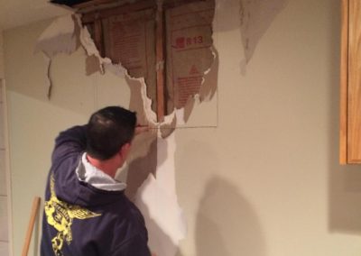 Cut along the drywall lines you made